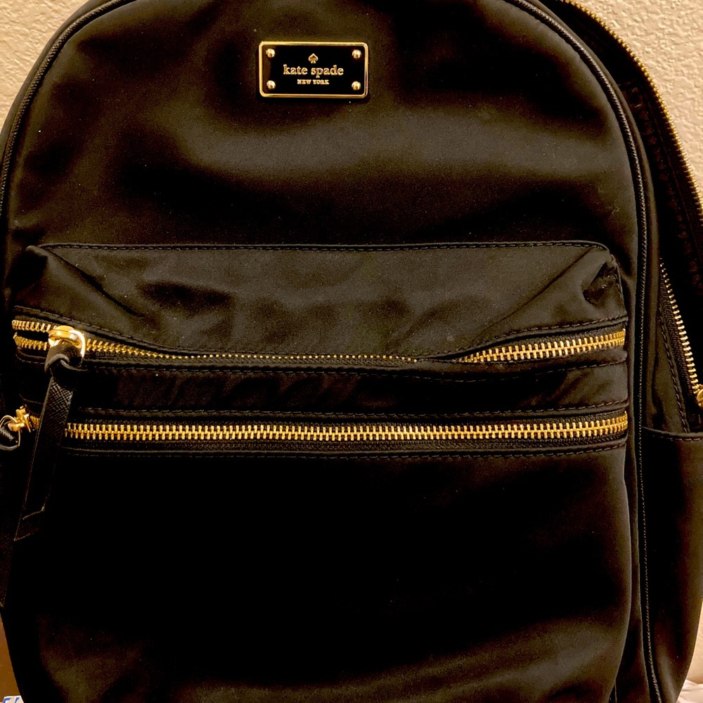 Brand New “without tags” Black and Gold Kate Spade backpack. Excellent condition